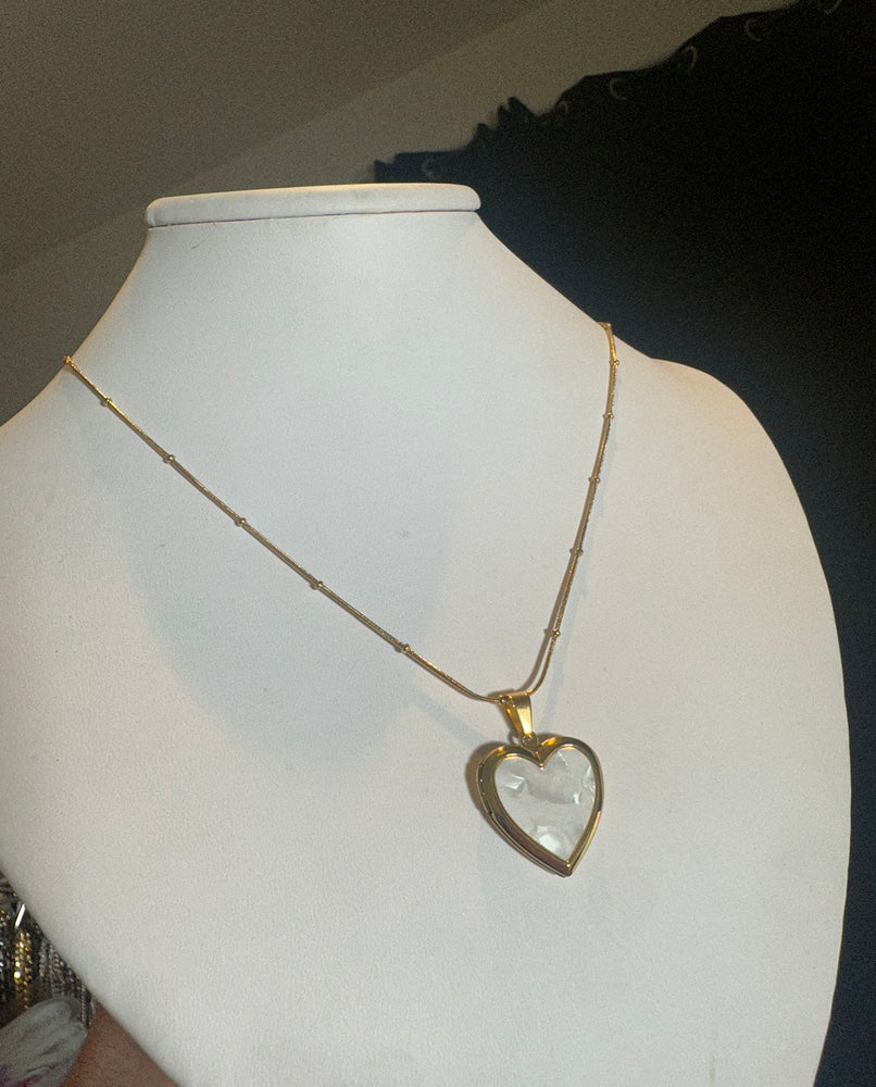 
                  
                    Shell Heart Locket Necklace
                  
                