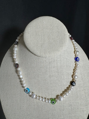 
                  
                    Evil Eye Pearls Necklace
                  
                