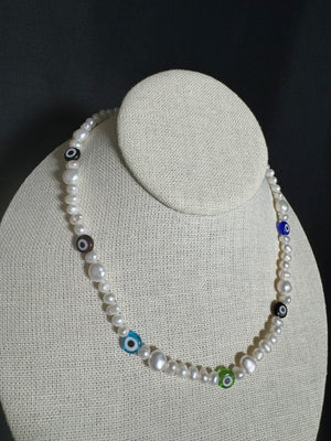 
                  
                    Evil Eye Pearls Necklace
                  
                