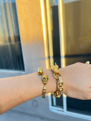 
                  
                    Gold Skull Bangle
                  
                