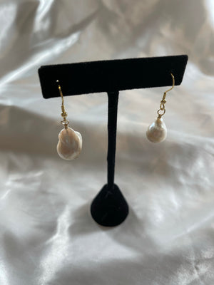 
                  
                    Melted Pearl Earring
                  
                