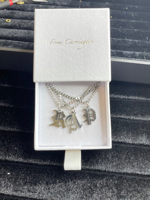 
                  
                    The Silver Letter Necklace
                  
                