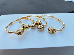 
                  
                    Gold Skull Bangle
                  
                